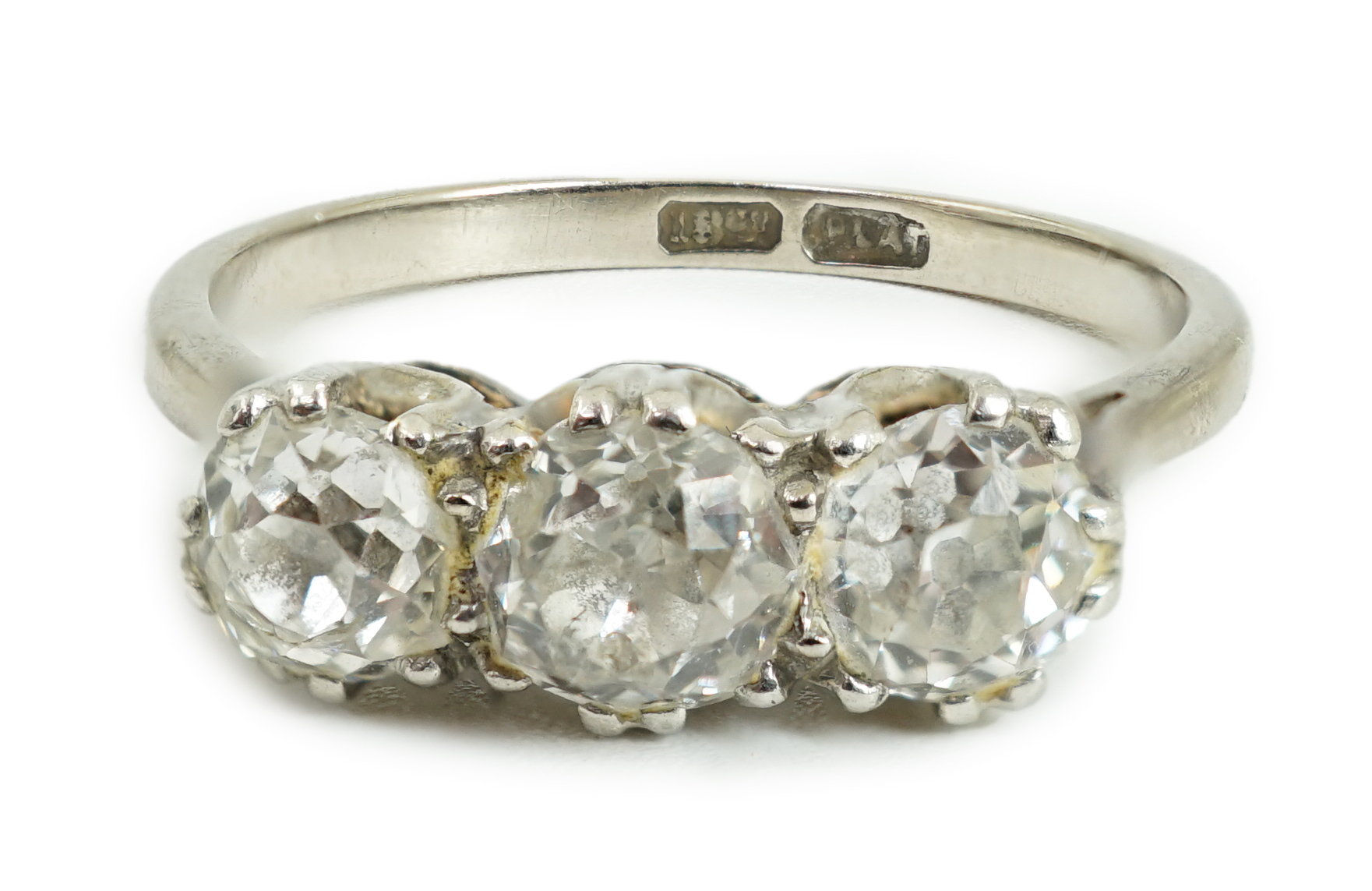 An 18ct white gold, platinum and three stone diamond set ring